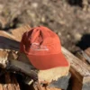 Orange cap front view on the display